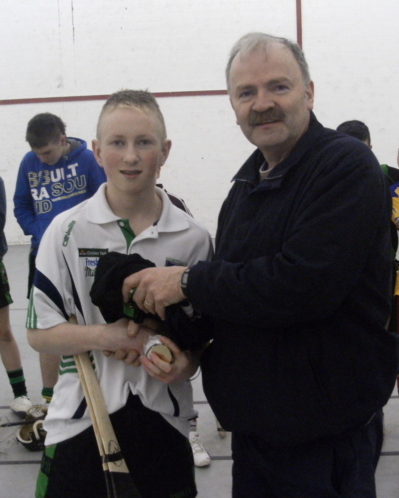 Darren McCarthy getting a presentation of playing gear in recognition of being selected for the county team in 2011